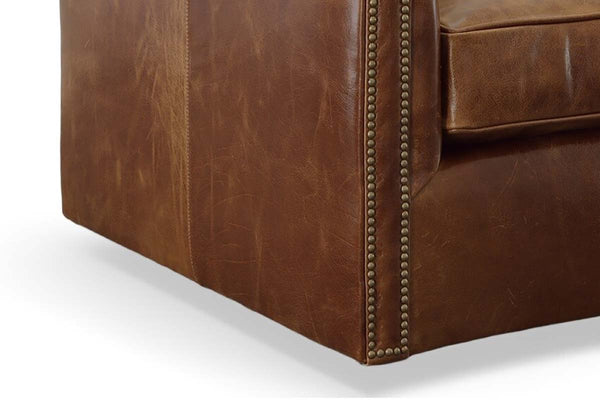 London Leather Tufted Swivel Accent Chair