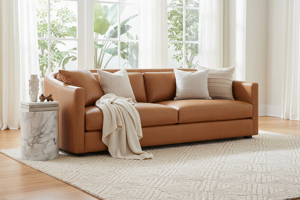 Savona 96 Inch Transitional Barrel Back Leather Track Arm Sofa
