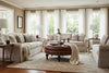 Image of Soren 38 Inch Round Button Tufted Ottoman With Turned Legs