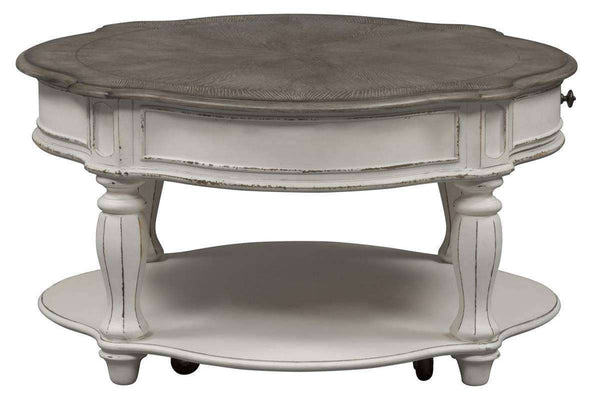 Canterbury Round Antique White Cocktail Table With Single Drawer And Shelf