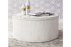 Image of Tristan II Farmhouse Style Distressed White Round Drum Cocktail Table