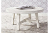 Image of Tristan II Farmhouse Style Distressed White Round Splay Leg Coffee Table