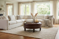 Arnold 38 Inch Round Bench Ottoman With Tapered Legs