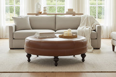 Carver 42 Inch Round Center Button Ottoman With Turned Legs