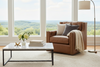London Leather Tufted Swivel Accent Chair