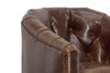 Image of Theodore Leather Tufted Swivel Accent Chair