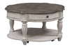 Image of Canterbury Round Antique White Cocktail Table With Single Drawer And Shelf