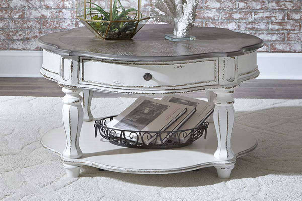 Canterbury Round Antique White Cocktail Table With Single Drawer And Shelf