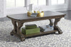 Image of Emile I Elegant Heathered Brown Coffee Table With Decorative Carvings And Lower Shelf