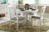 Image of Freeport Oyster White 5 Piece Round Oval Pedestal Dining Table Set With Padded Slat Back Chairs